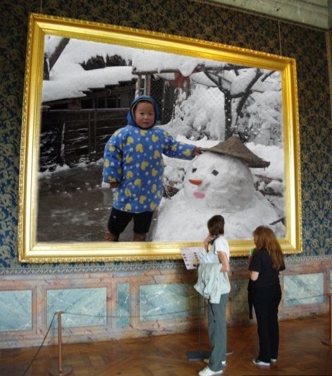 冬天里爸爸和我堆了一个雪人